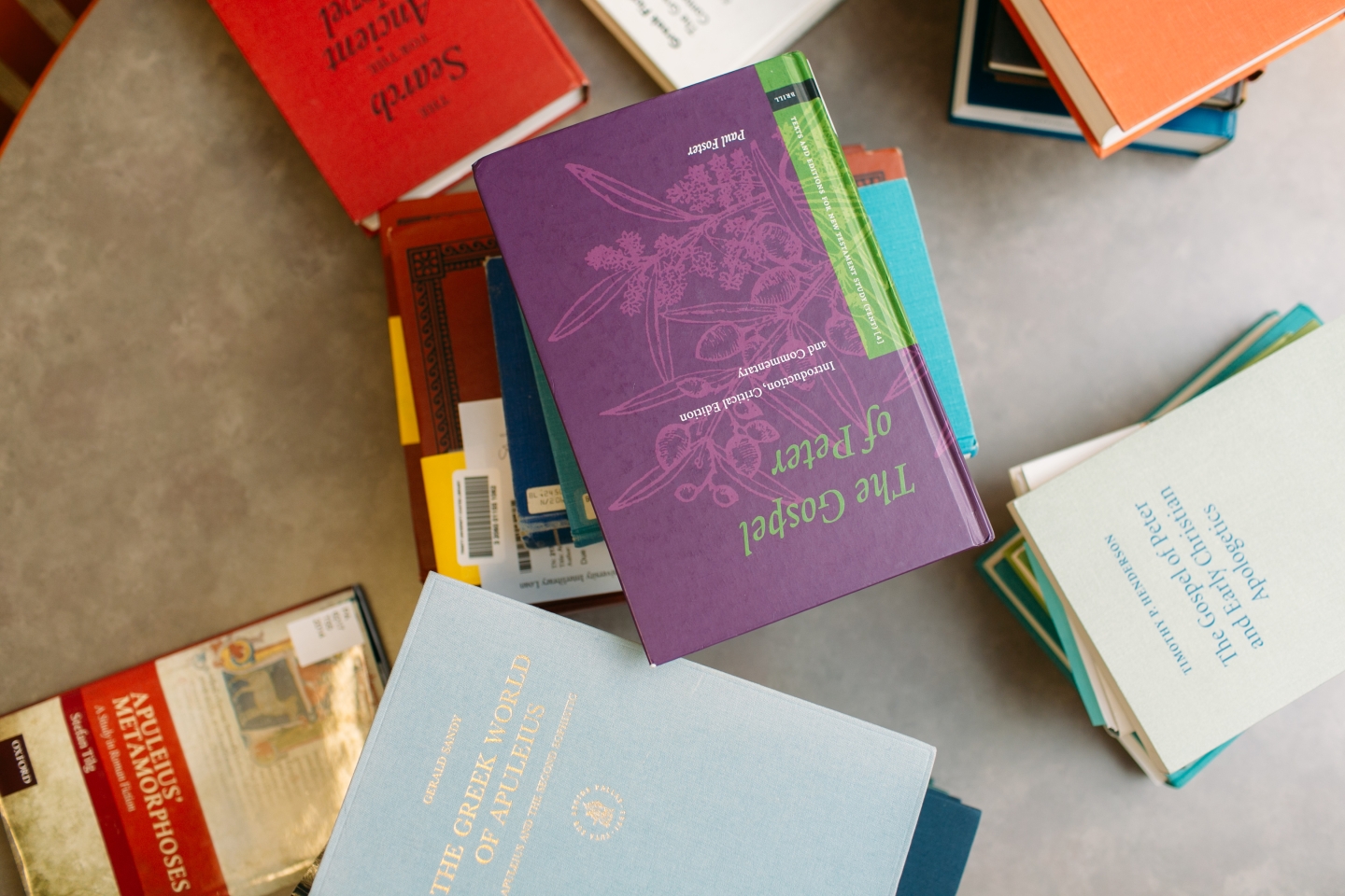 Multiple stacks of colorful music composition books