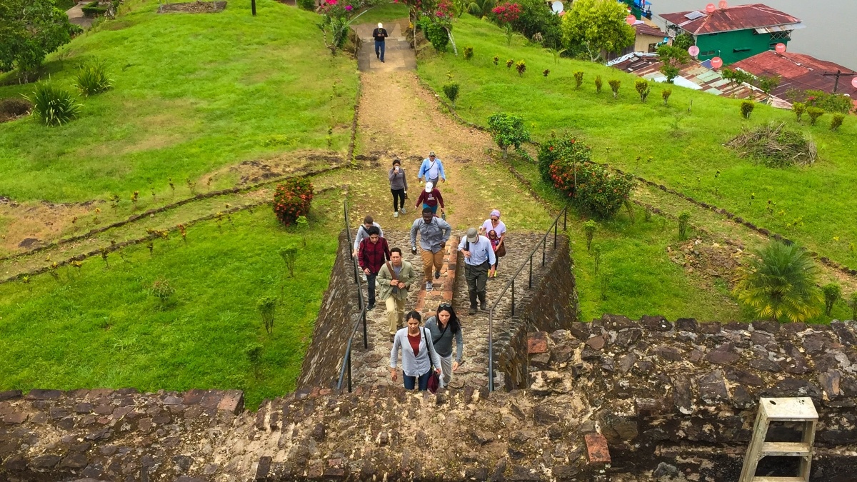 Student hiking in ancient ruins