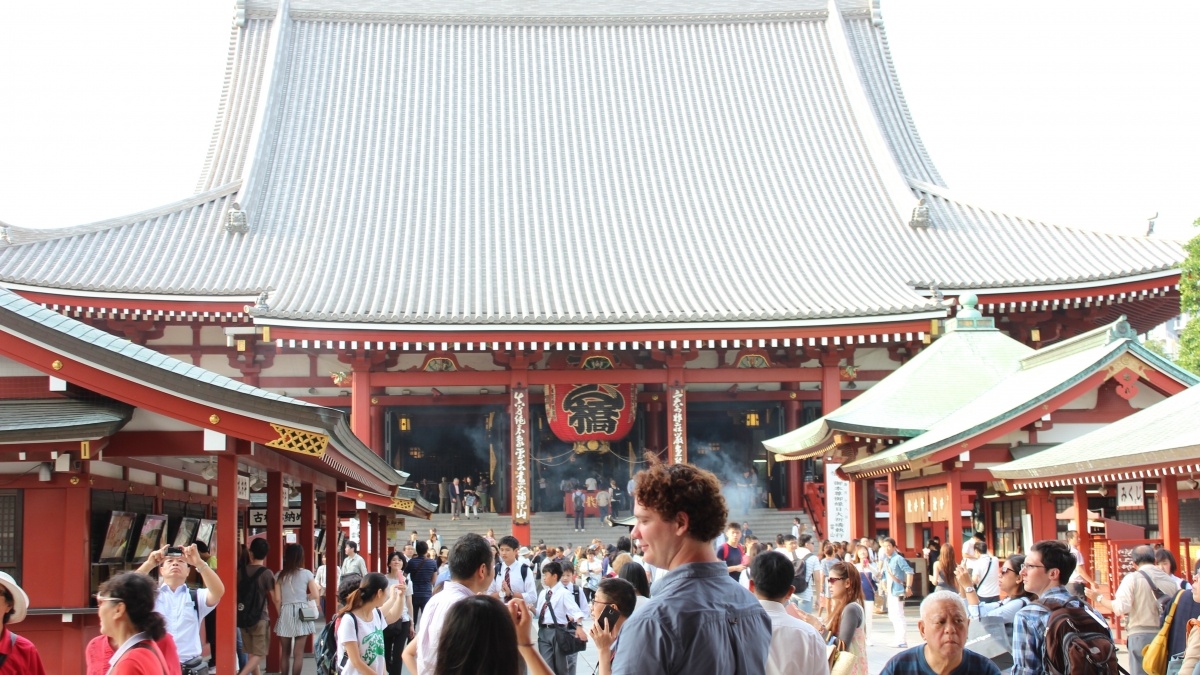 crowd in front of a Buddhist temple